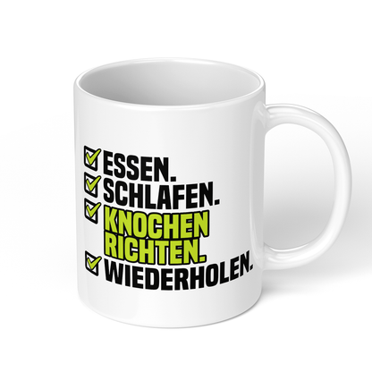 CupHaven® Orthopädie Tasse - Essen. Schlafen. Knochen richten. Wiederholen. - Geschenk für Orthopäden und Orthopädinnen